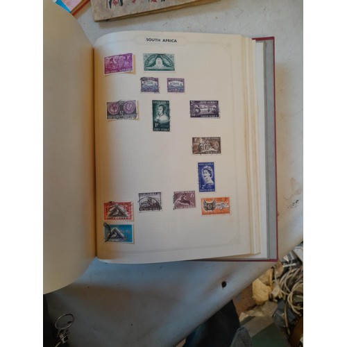 114 - Stamps : a varied collection of mainly used stamps of the world in a variety of albums, schoolboy co... 