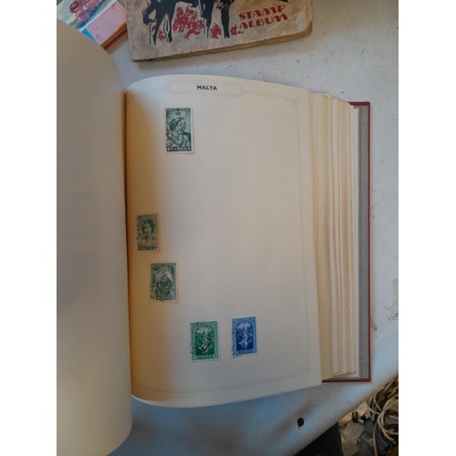 114 - Stamps : a varied collection of mainly used stamps of the world in a variety of albums, schoolboy co... 