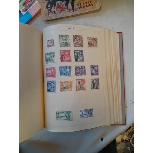 114 - Stamps : a varied collection of mainly used stamps of the world in a variety of albums, schoolboy co... 