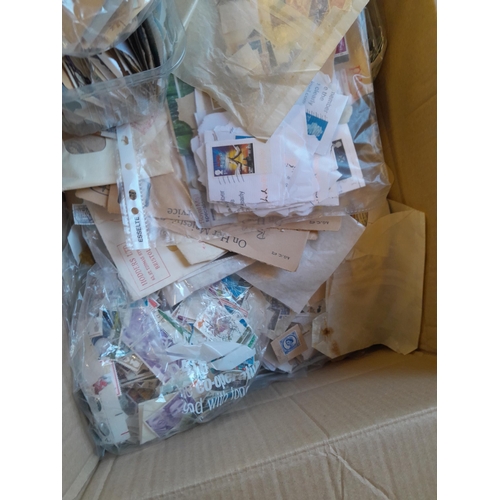 143 - Stamps : approx 5 kg of used GB in a box, mostly QEII era in packets, envelopes etc. good rummagers ... 