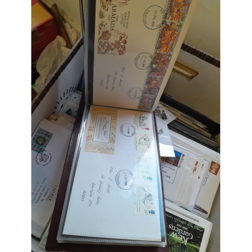 141 - Box of GB Stamp First Day Cover in 2  binders and large quantity of loose approx 14 kg