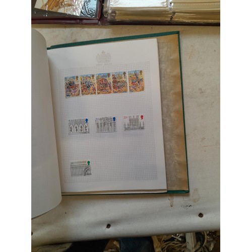 157 - Stamps of GB mainly used in five albums and three stock books with a folder of PHQ cards approx 11 k... 