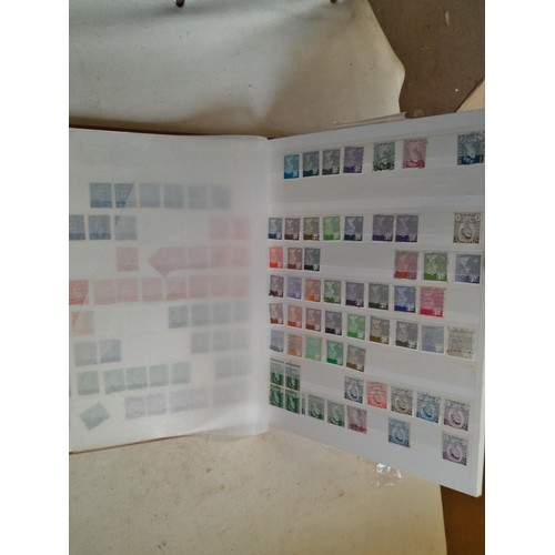 157 - Stamps of GB mainly used in five albums and three stock books with a folder of PHQ cards approx 11 k... 