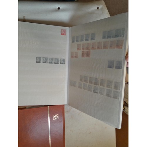 157 - Stamps of GB mainly used in five albums and three stock books with a folder of PHQ cards approx 11 k... 