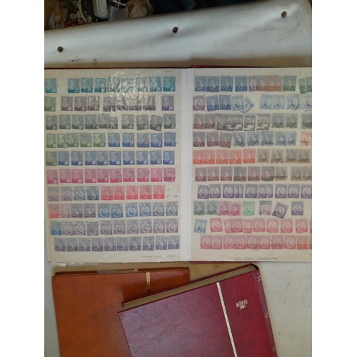 157 - Stamps of GB mainly used in five albums and three stock books with a folder of PHQ cards approx 11 k... 