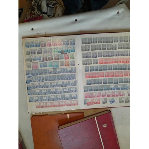 157 - Stamps of GB mainly used in five albums and three stock books with a folder of PHQ cards approx 11 k... 