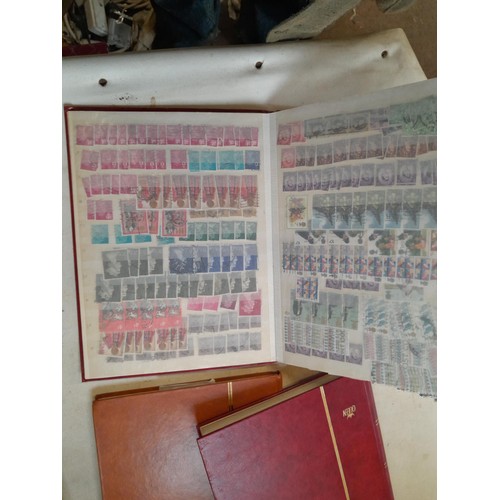 157 - Stamps of GB mainly used in five albums and three stock books with a folder of PHQ cards approx 11 k... 