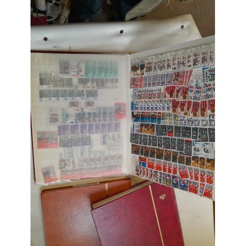 157 - Stamps of GB mainly used in five albums and three stock books with a folder of PHQ cards approx 11 k... 