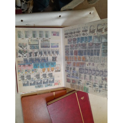 157 - Stamps of GB mainly used in five albums and three stock books with a folder of PHQ cards approx 11 k... 