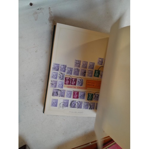 157 - Stamps of GB mainly used in five albums and three stock books with a folder of PHQ cards approx 11 k... 