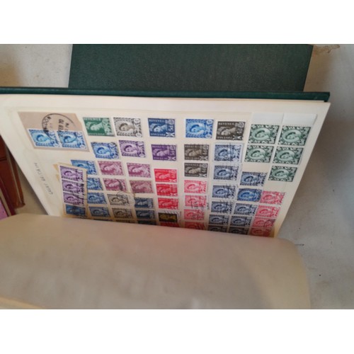 157 - Stamps of GB mainly used in five albums and three stock books with a folder of PHQ cards approx 11 k... 