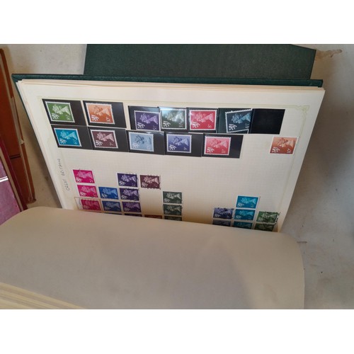 157 - Stamps of GB mainly used in five albums and three stock books with a folder of PHQ cards approx 11 k... 