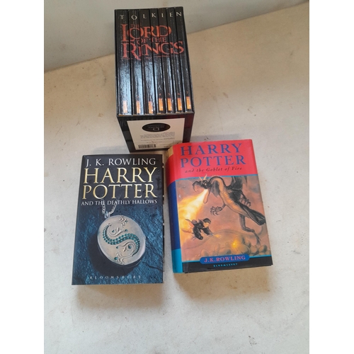 100 - 2 x Harry Potter Volumes and Tolkien set in slip cover