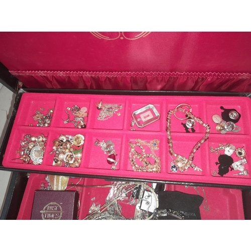 77 - Jewellery casket full of gold plated and other costume jewellery , small amount of silver noticed