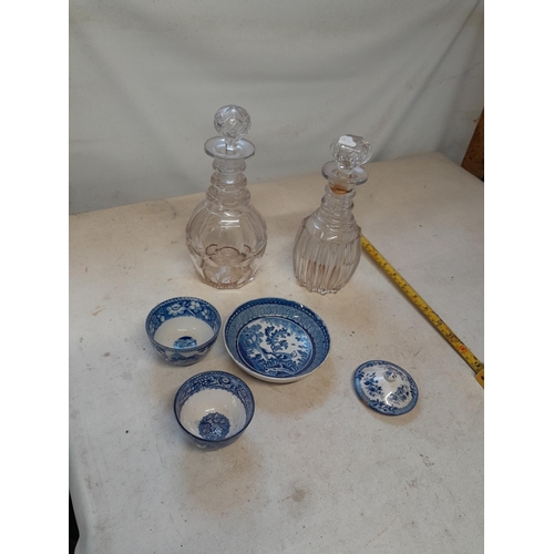 217 - 2 x 19th century cut glass decanters one with frits and 19th century blue and white pottery items