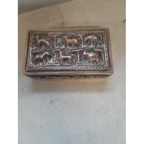 237 - Early 20th century Indian silver, probably lower grade cigarette box with hinged lid embossed with p... 