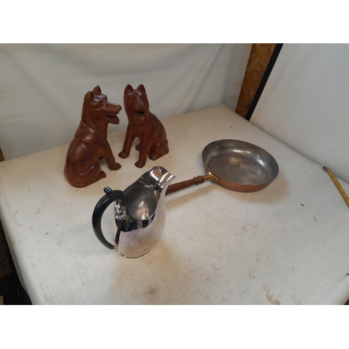 264 - Vintage copper frying pan, silver plate jug and pair of carved wood dogs