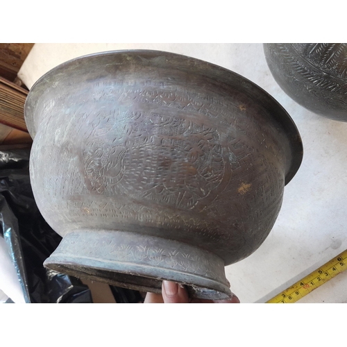 269 - 19th century Kashmiri ware gunmetal bowl and vase, profusely etched with exotic animals