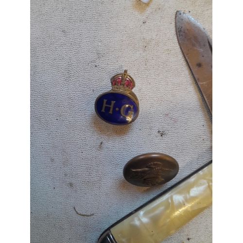 387 - World War II enamel Home Guard badge, penknife and button