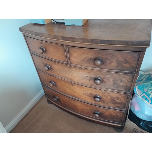 412 - Victorian mahogany bow front chest of drawers with bun handles , two short and three long graduated ... 