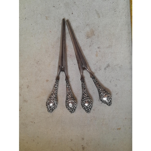 180 - 2 x pairs of silver handle glove stretchers