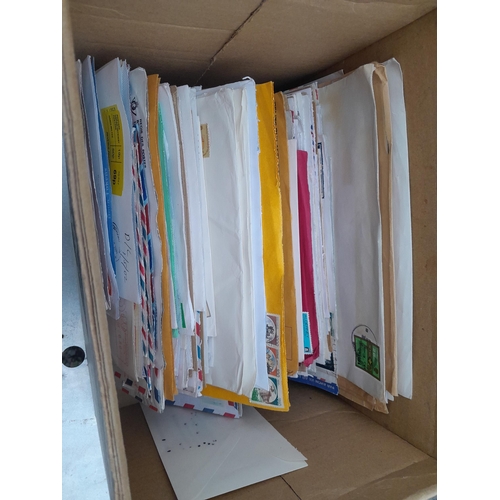 41 - Box of Stamps on paper, and a box of philatelic reference material, mainly on Africa including South... 