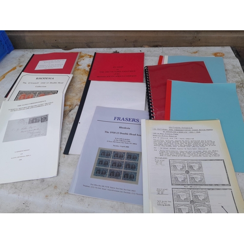 41 - Box of Stamps on paper, and a box of philatelic reference material, mainly on Africa including South... 