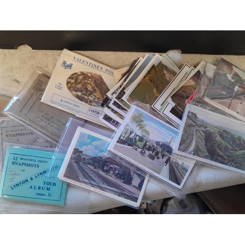 241 - Postcards : empty albums, card sleeves, postcards of Lynmouth, Alcaster and environs, political figu... 