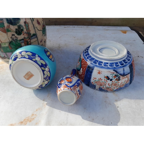 11 - Vintage Famille Rose style jar and cover and damaged Imari bowl and one other Japanese vase