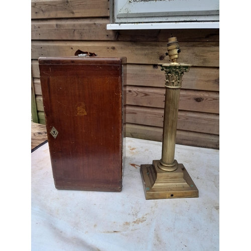 54 - Vintage brass Corinthian column table lamp, wooden microscope box, and vintage leather suitcase with... 
