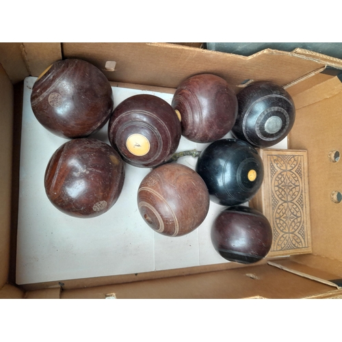 61 - Box of vintage and antique lawn bowling woods one with silver cap