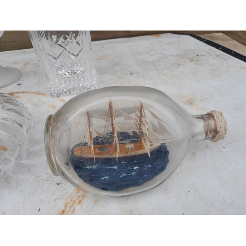 74 - Assorted glassware, ship in a bottle etc.