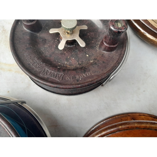 75 - Vintage fishing reels : non maker wood and brass salmon and boat reels, 2 x Alvey bakelite reels