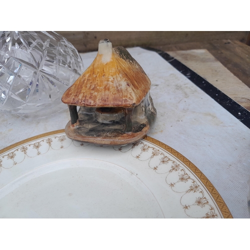 84 - Box of oddments : glass paperweight, chipped Art Deco Baccarat style ashtray, Torquay money bank etc