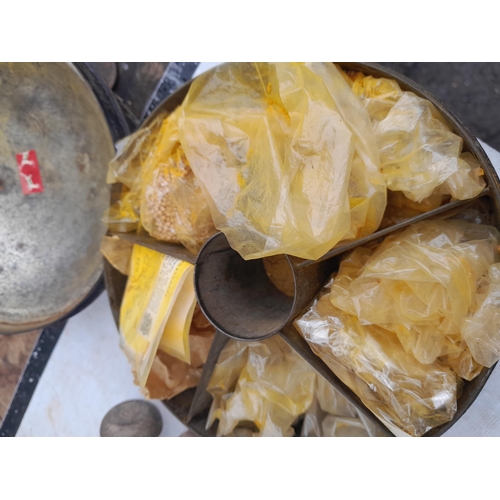 93 - Box of oddments : wooden ware, resin longcase clock ornaments, 20th century Jolly Money Box, damaged... 