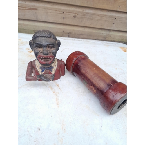 93 - Box of oddments : wooden ware, resin longcase clock ornaments, 20th century Jolly Money Box, damaged... 