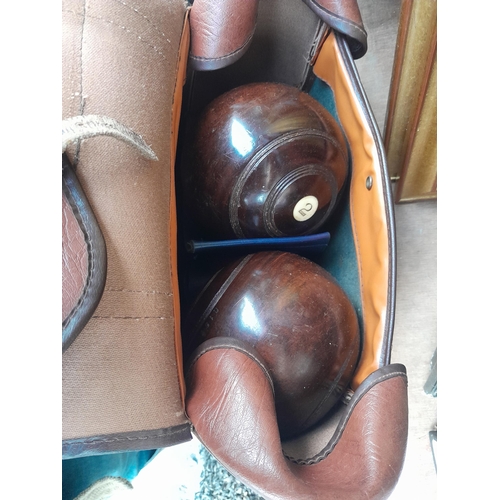 118 - Mantle clock with later  quartz movement, bowling woods, Christmas decorations etc.