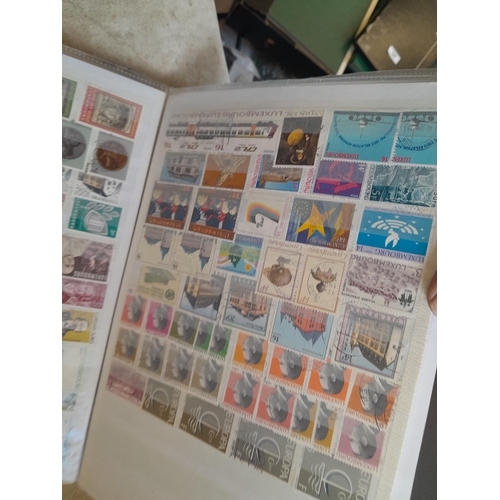 130 - Stamps mixed era world collection, some mint used and unused, in differing formats