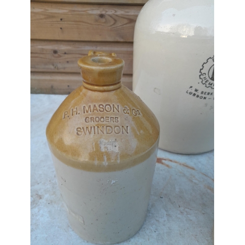 14 - Advertising and non advertising stoneware flagons, bread bin, chip on rim