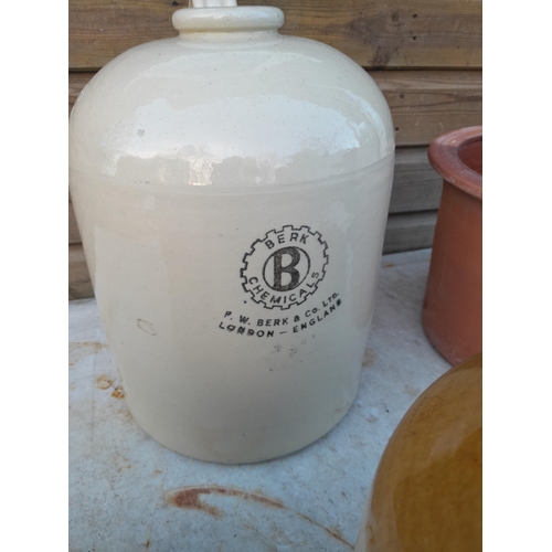 14 - Advertising and non advertising stoneware flagons, bread bin, chip on rim