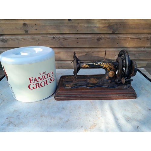 26 - 19th century fiddle base sewing machine no box & plastic advertising ice bucket