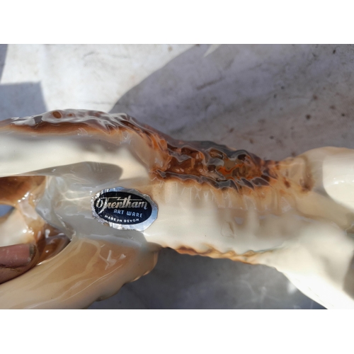 41 - Trentham pottery dog and storage jar and cover