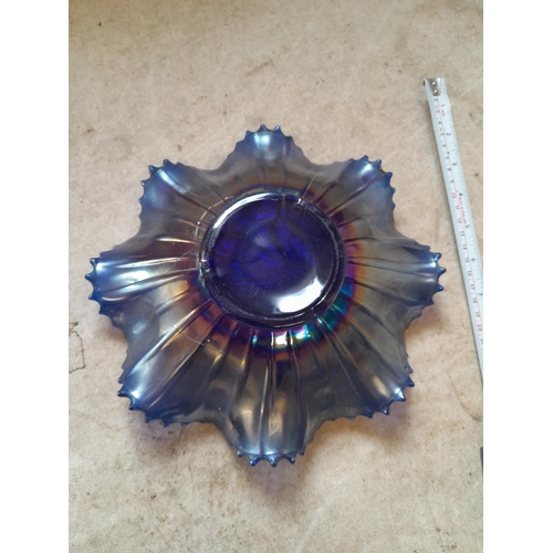 42 - Iridescent cobalt blue probably Northwood carnival glass dish decorated with Peacocks on a fence