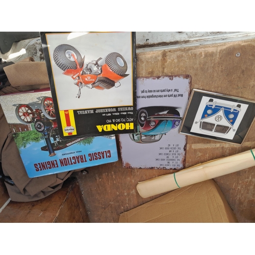 48 - Box of oddments : tin sign modern, resin ornament, car related manuals, prints, African walking stic... 