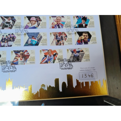 56 - Ltd Edition Olympic stamps mint sheet behind glass