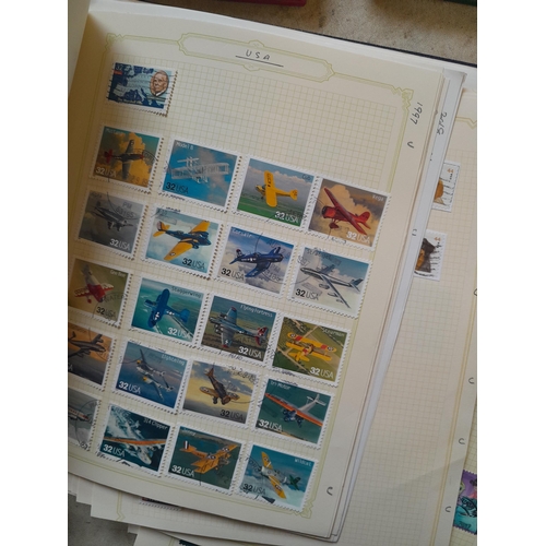 134 - Stamps of USA in three folders 1000 plus stamps mint unused and used, only a small sample photograph... 