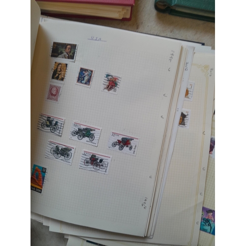 134 - Stamps of USA in three folders 1000 plus stamps mint unused and used, only a small sample photograph... 