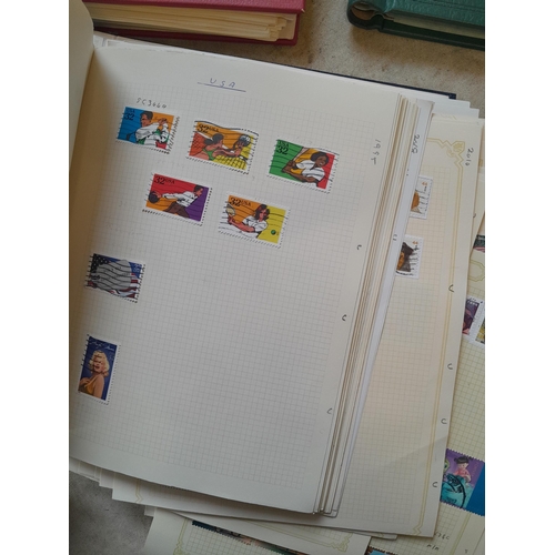 134 - Stamps of USA in three folders 1000 plus stamps mint unused and used, only a small sample photograph... 