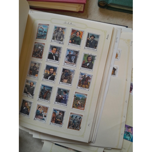 134 - Stamps of USA in three folders 1000 plus stamps mint unused and used, only a small sample photograph... 