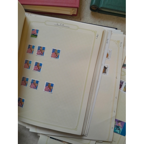 134 - Stamps of USA in three folders 1000 plus stamps mint unused and used, only a small sample photograph... 